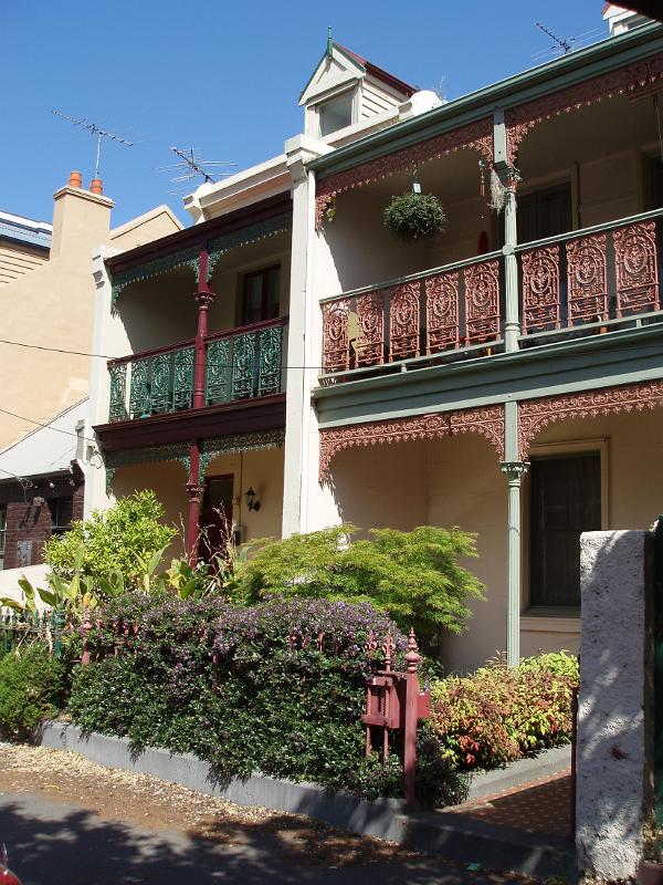 Exterior Design of Australian House Building with Terrace and Mini Garden in Front Located in Melbourne