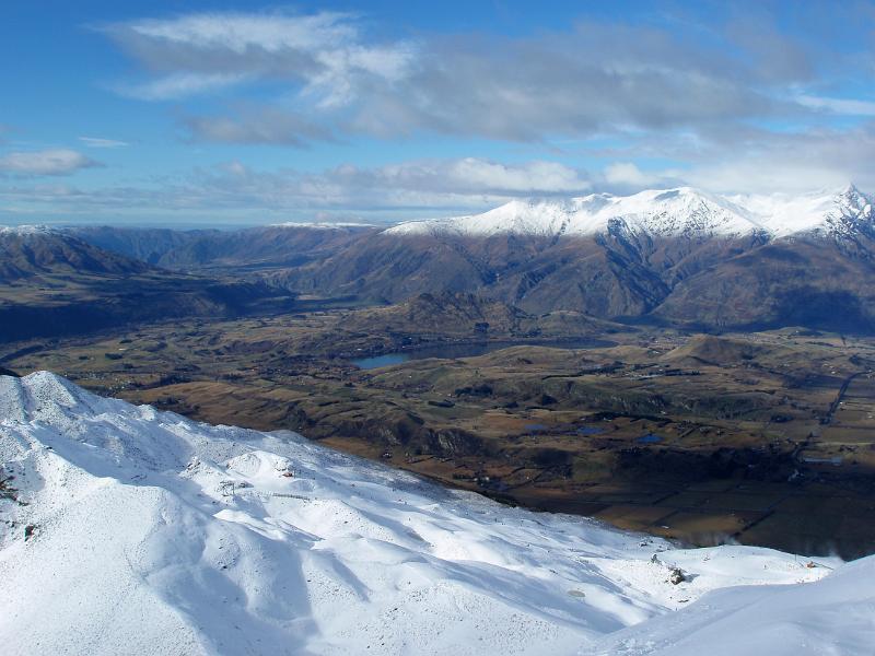 snow covered mountains viewed from coronet peak
