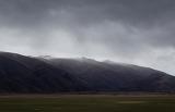 a dark stormy day in the mountains between tekapo and queenstown