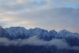 jagged mountain panorama, the remarkables range in winter with a covering of snow