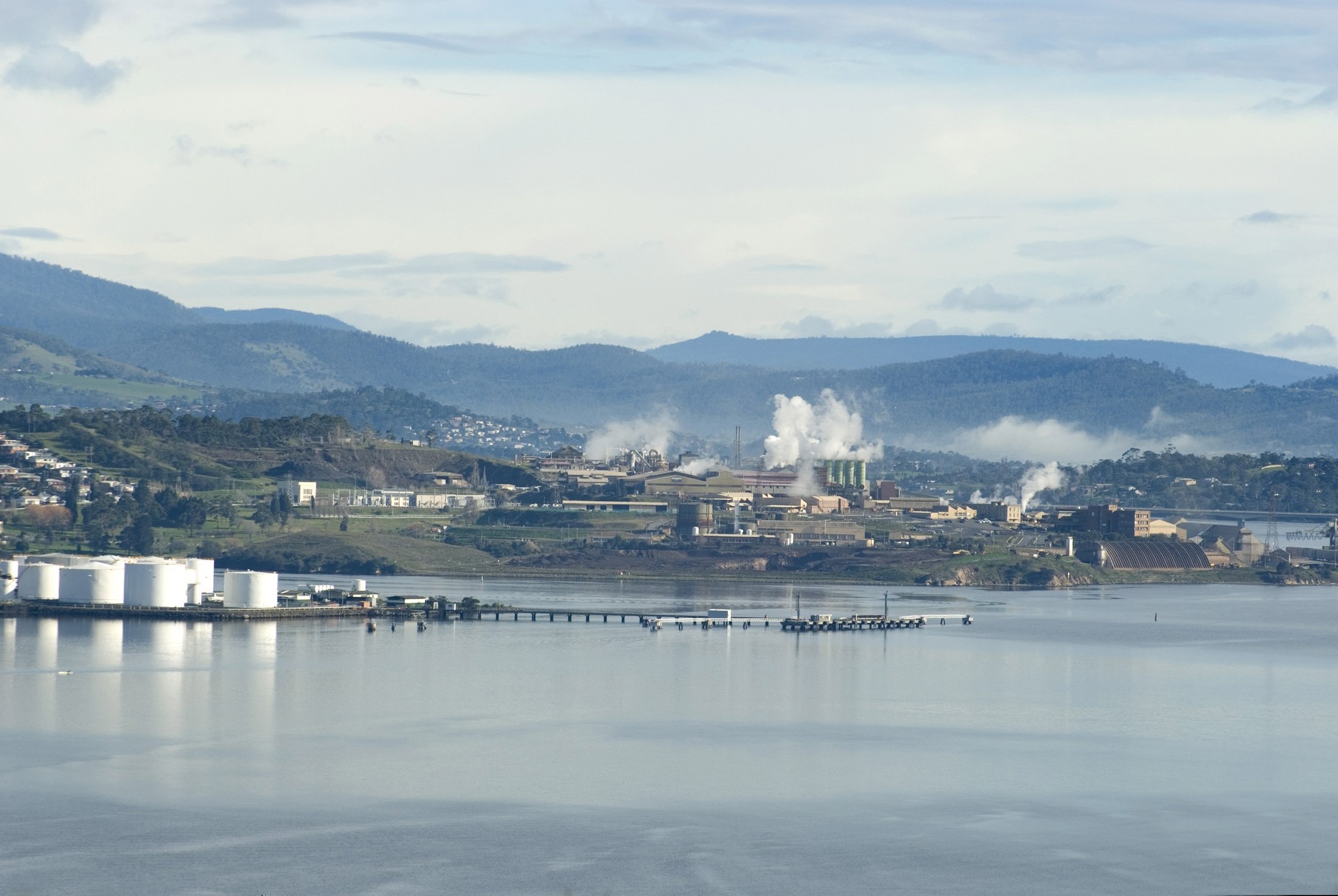 an image of paper mills and heavy industry along the banks of the derwent river, tasmania
