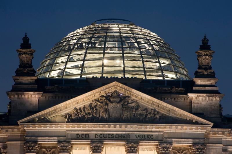 the dome on top of the berlin reichstag at night