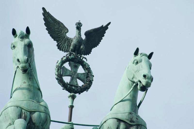 close up on the staff held by Victoria, roman goddess of vistory, on top of the brandenburg gate, berlin, germany