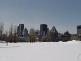 Montreal City Skyline in Winter as seen from Snow Covered Park