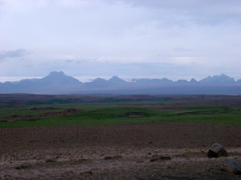 Overcast Sky and Hazy Icelandic Mountain Scenic with Valley in Foreground