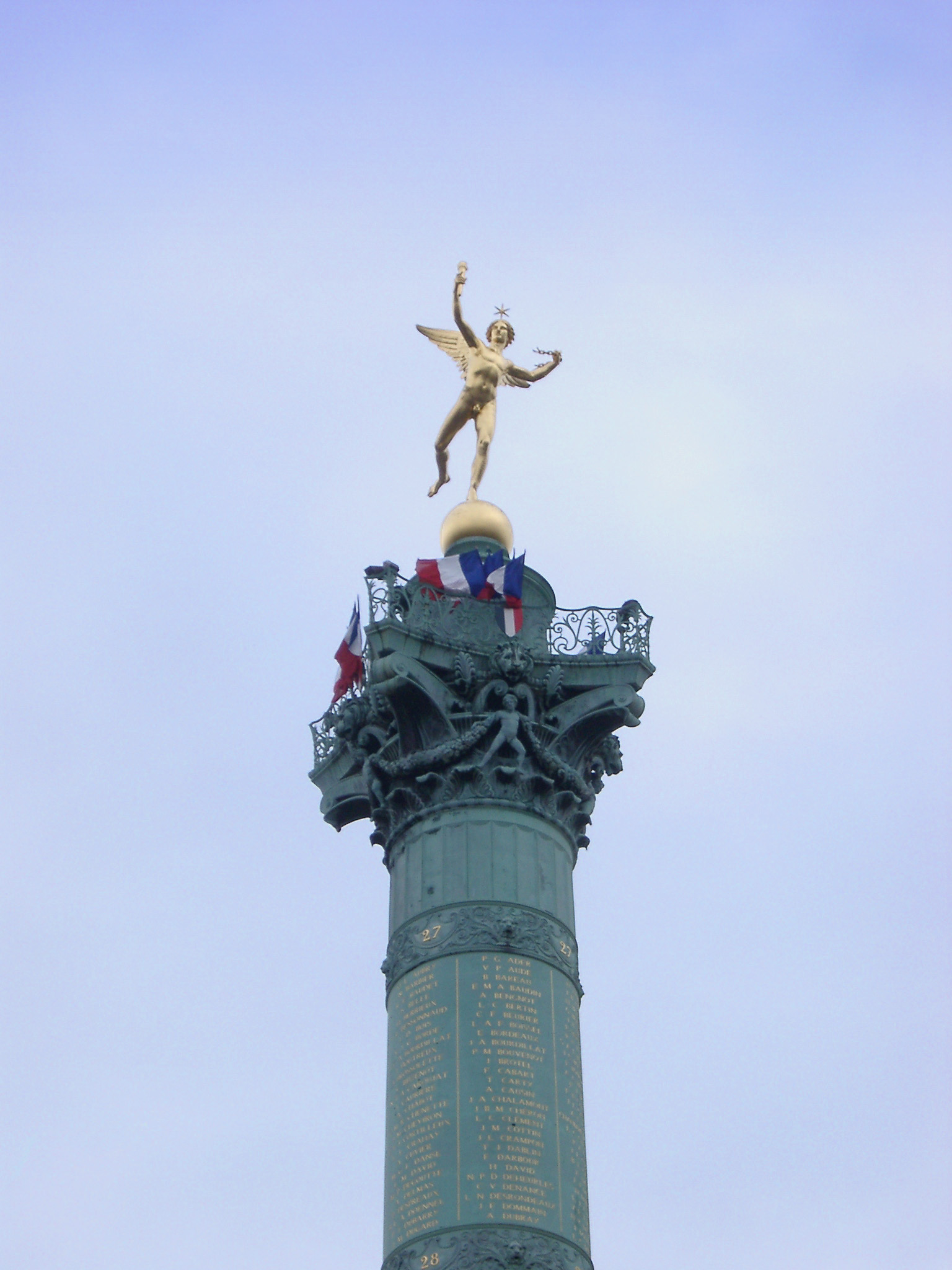 an image of Vintage High Monument of Place de la Bastille. Isolated on Light Blue Sky Background.