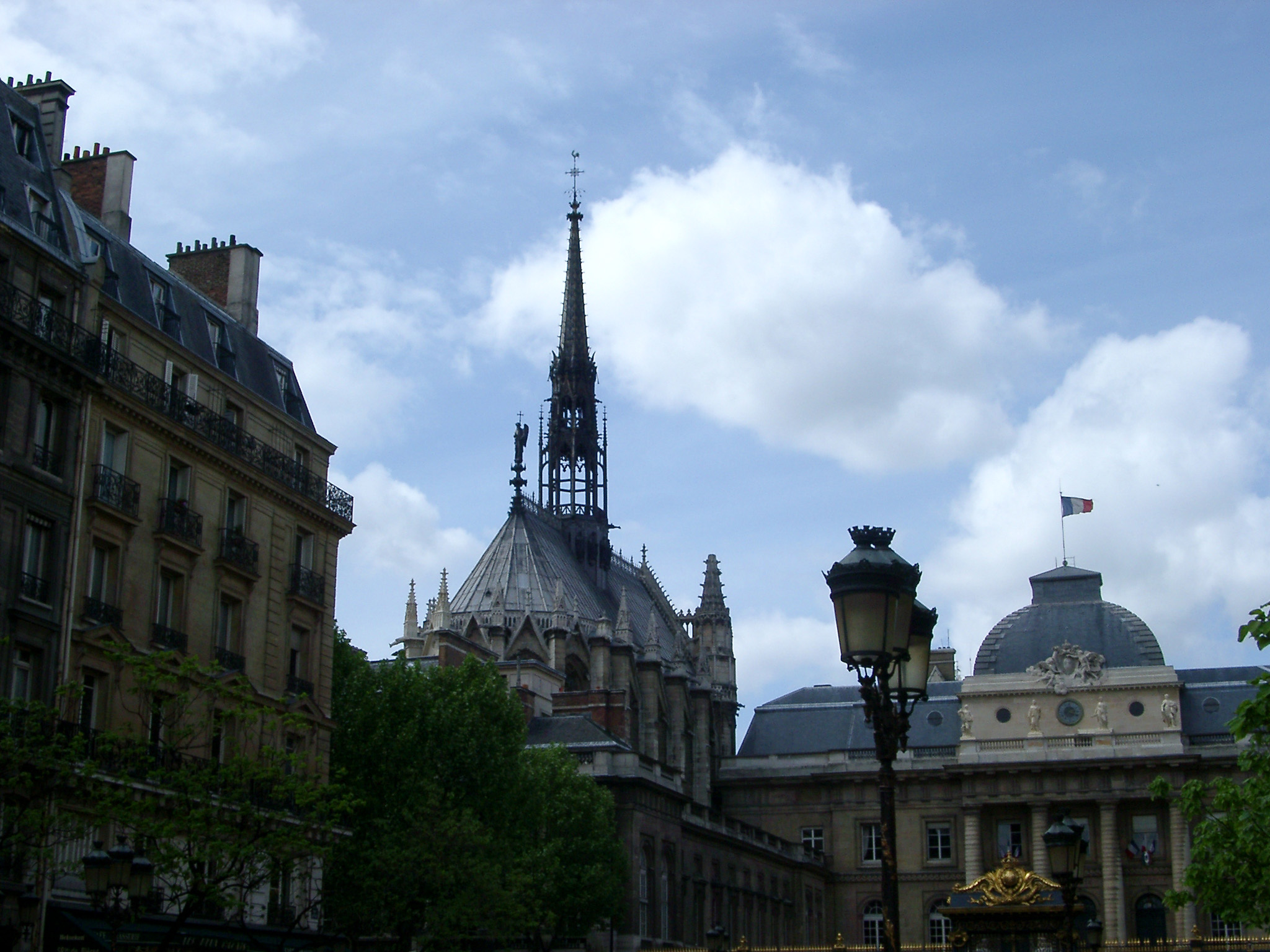 an image of Historic Architectural La Sainte Chapelle Located in Paris. Isolated on Light Blue Sky Background.