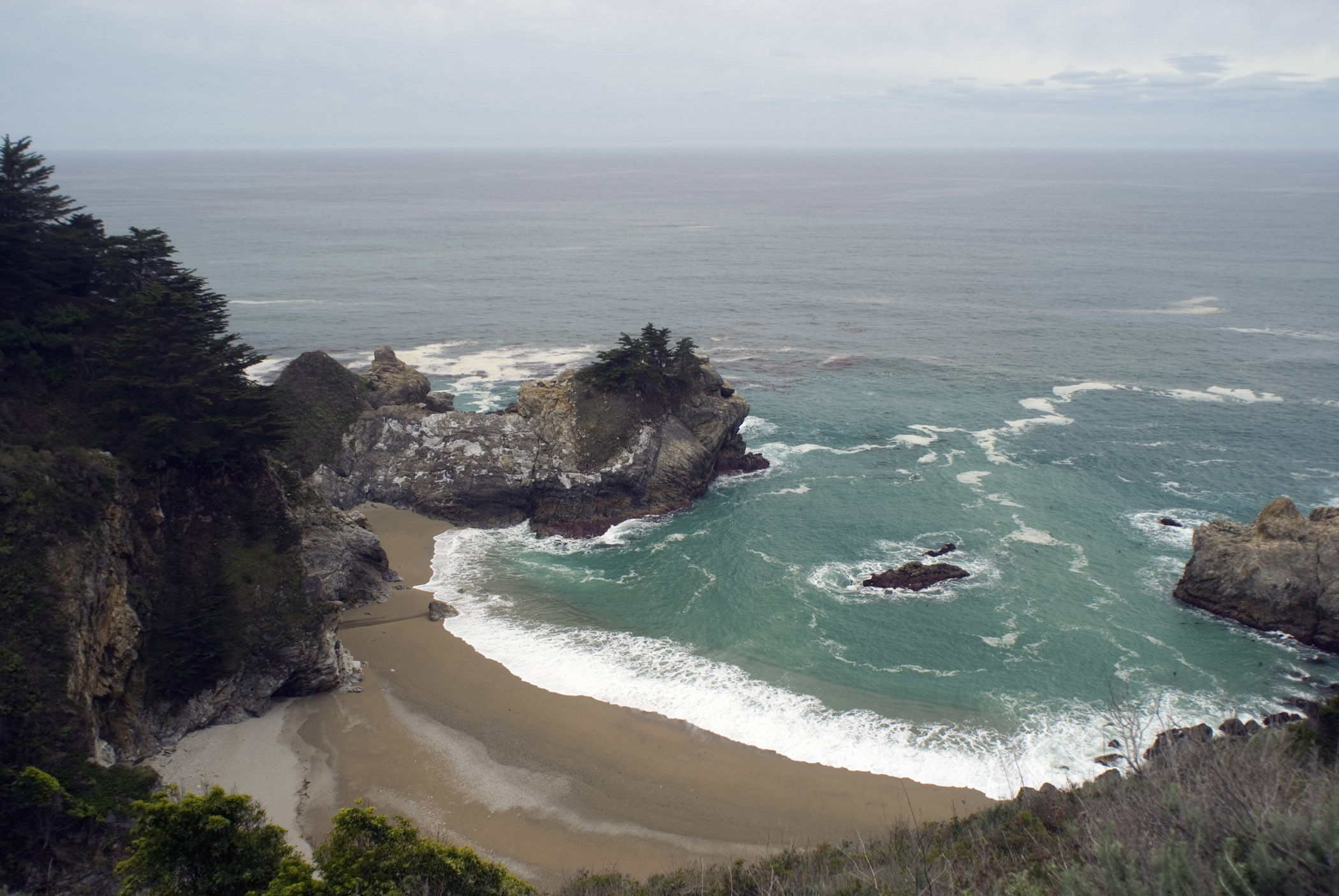 an image of McWay Falls in the Julia Pfeiffer Burns state park in Monterey County, California a scenic coastal view of a national landmark