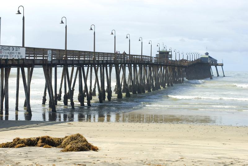 Long Vintage Pathway to Imperial Beach Restaurant in California. Isolated on Lighter Blue Sky Background.