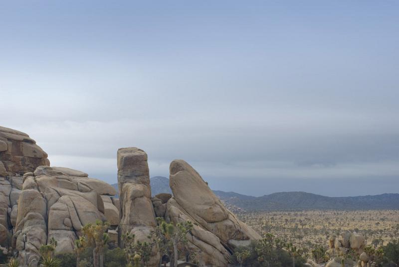 Big Rocks at Joshua Tree National Park, Isolated on Light Blue Gray Sky Background.