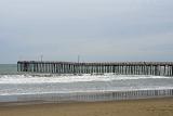 Beautiful Beach Spot at Cayucos Pier in Extensive View. Isolated on Lighter Blue Gray Sky Background.