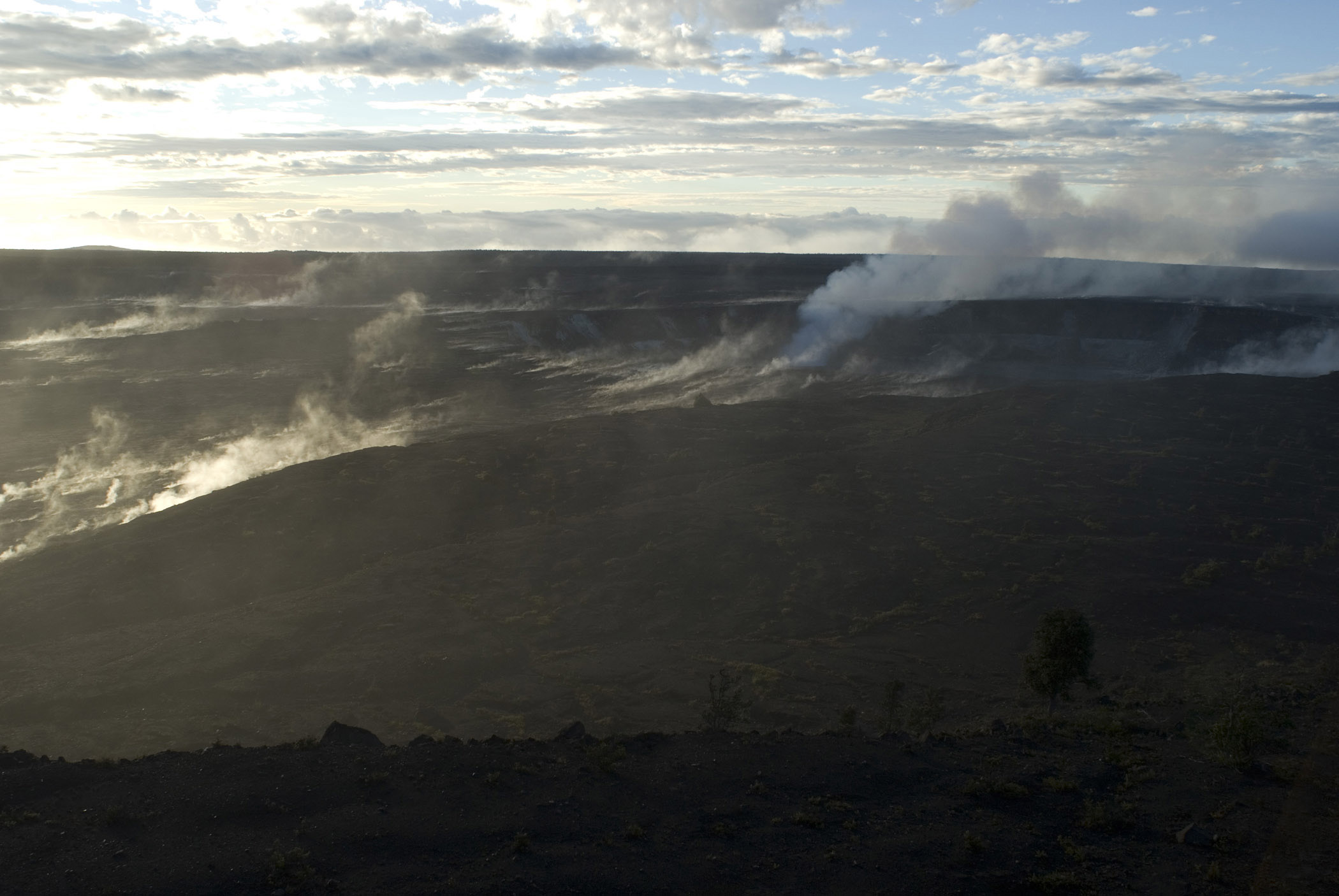 an image of Smoke from the Ground of Volcanoes National Park in Wide angle View.