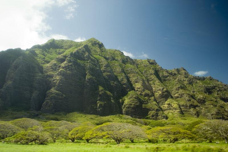 Close up Beautiful Green Koolau Mountain Range. Isolated on Light Blue Sky Background.