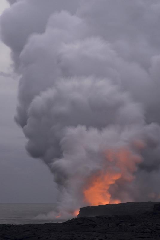 Volcano Spewing Red Hot Lava and Steam on the Coast of Hawaii