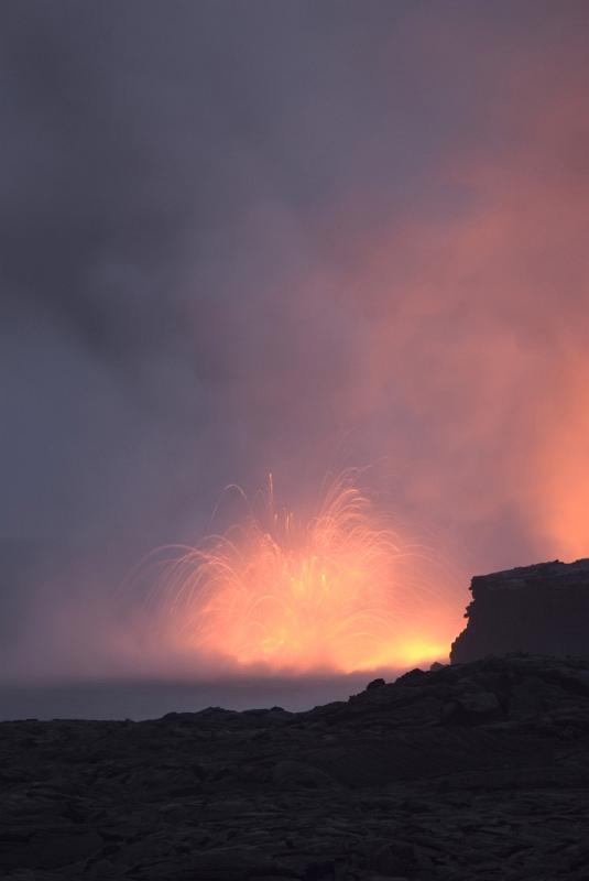 Smoke From Red Hot Volcanic Lava Captured a Night.