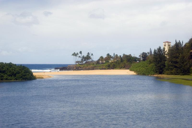 Scenic view of the sheltered lagoon and bay at Waimea Beach Park, Ohau, Hawaii