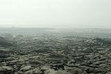 Smoke at Black Surface Textured Lava Field in Extensive Panoramic View, Located in Hawaii.