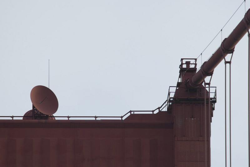Golden Gate Bridge detail Golden Gate Bridge detail showing the structure of one of the towers with a communications dish and part of a suspension cable