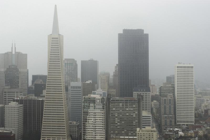 San Francisco fog and sea mist shrouding the skyscrapers and high-rise buildings in the city centre