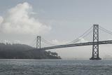Famous Landmark Bay Bridge in San Francisco with cloudy sky