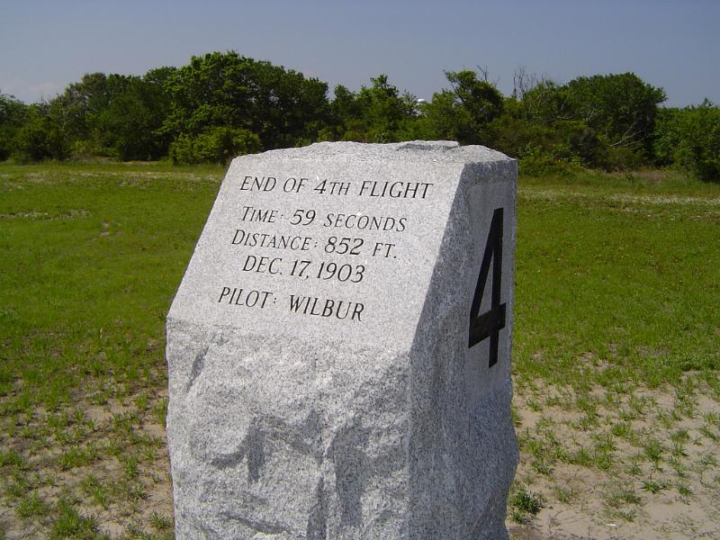 Kitty Hawk memorials Kitty Hawk memorials with a marker for the fourth flight by Wilbur and Orville Wright showing the duration and distance