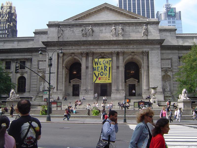 Old Vintage New York Public Library on Street Side Random People Passing In Front Old Vintage New York Public Library Building on Street Side. Captured Front View.
