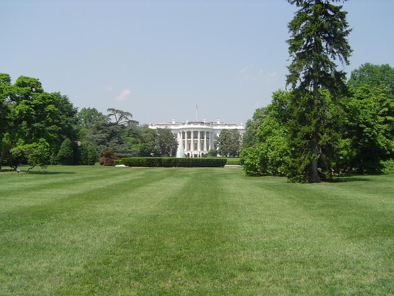 The White House, Washigton DC, USA View across manicured lawns of the exterior facade of The White House, Washigton DC, USA