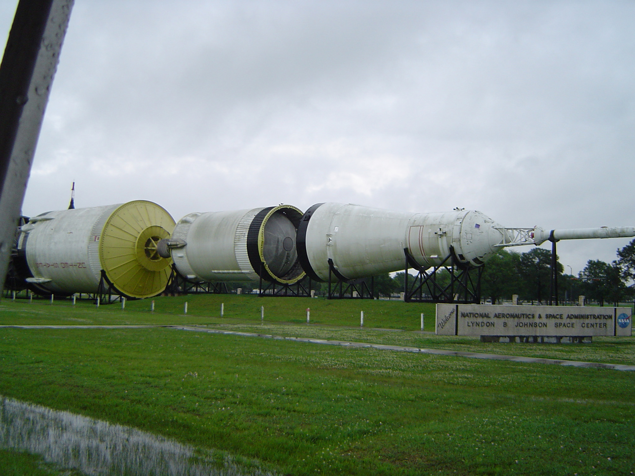 an image of Saturn 5 space ship modules on display at NASA, a historical reminder of the space race