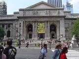 Random People Passing In Front Old Vintage New York Public Library Building on Street Side. Captured Front View.