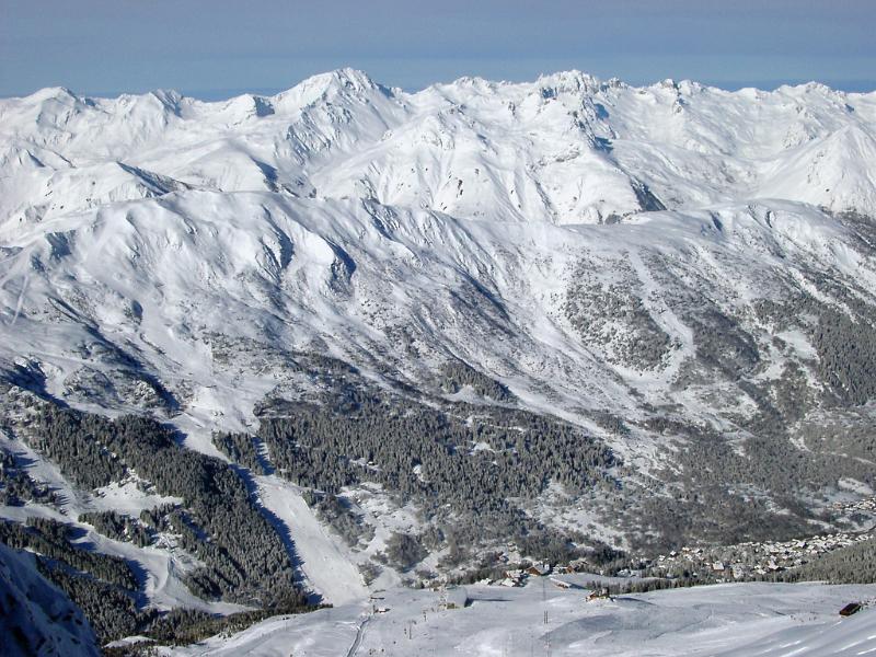 Snow covered mountain ranges with rugged peaks encased in fresh white snow in winter in France