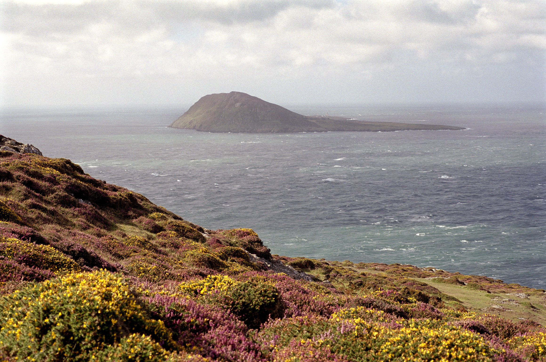 an image of Bardsey Island off the Llyn Peninsula, Gwynedd, Wales, an important religious pilgrimage destination since medieval times with an early monastery