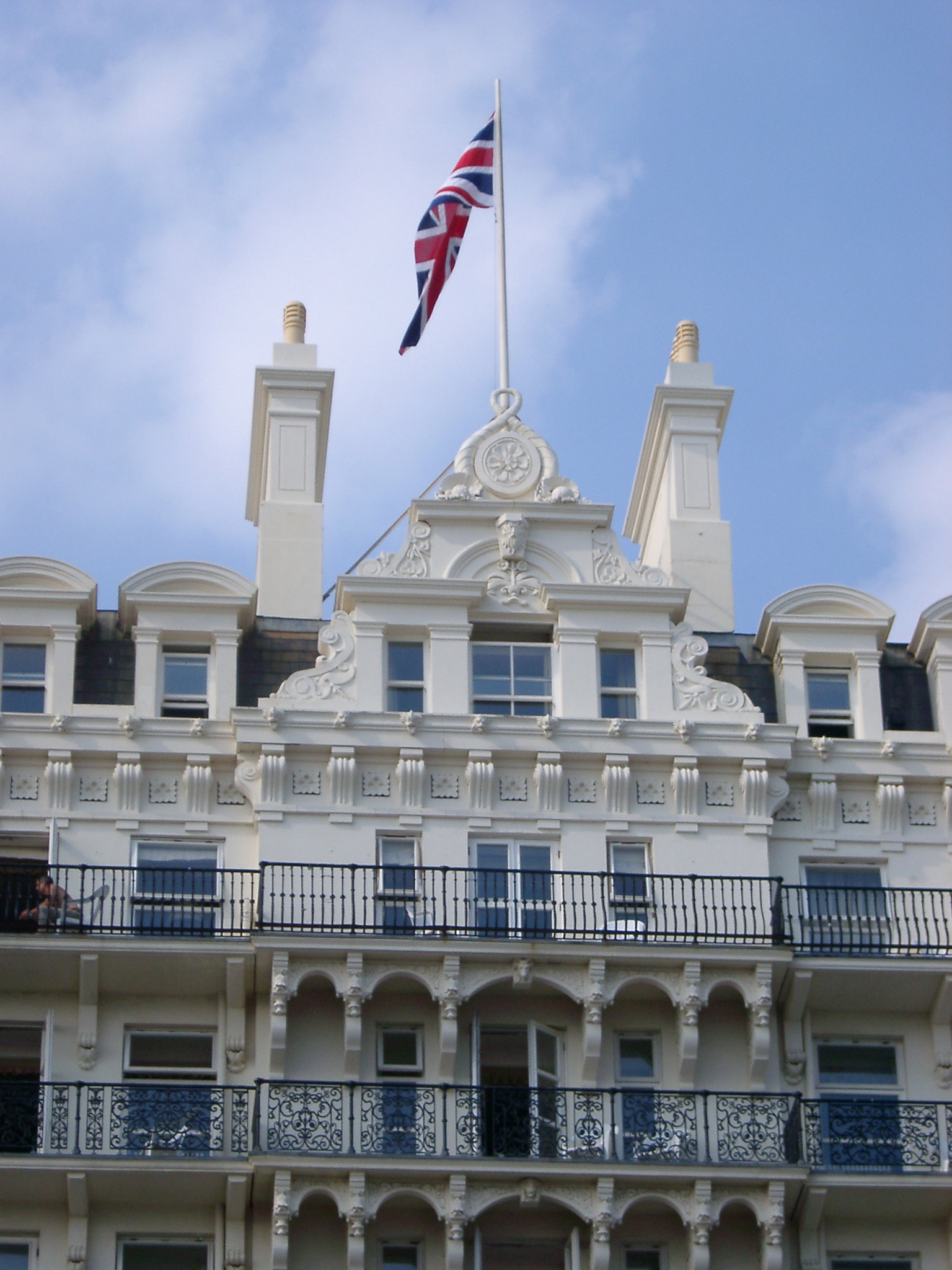 an image of Close Up of Union Jack Flag on Top of Grand Hotel, Brighton, England