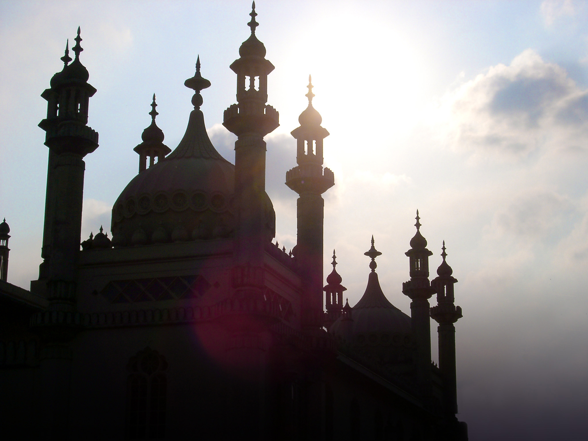 an image of Famous Architectural Royal Pavilion Building in Brighton, England, Reflected by Sunlight.