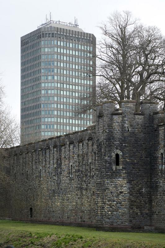 old and modern cardiff, the castle walls and an office block