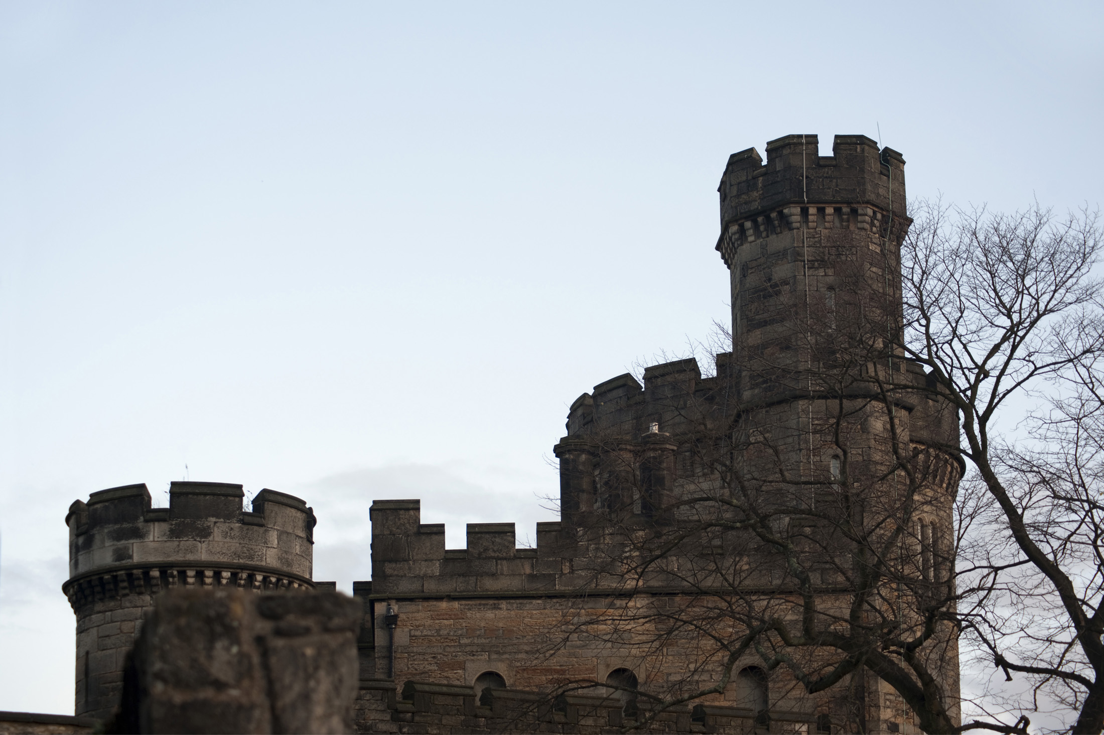 an image of castelated walls of the governors house on carlton hill, part of the old Calton Jail, Edinburgh