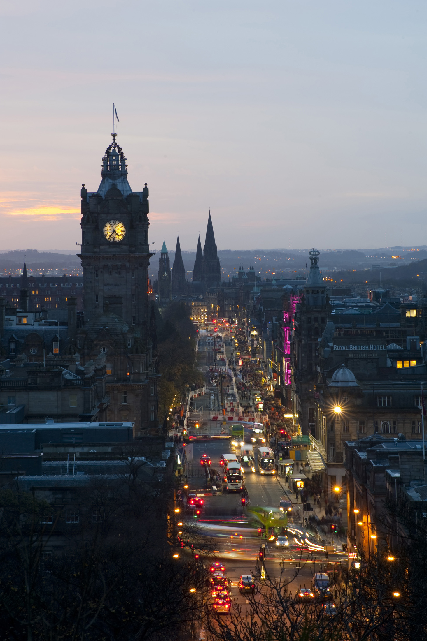 an image of Bustling nighlife on Princes street Edinburgh at night