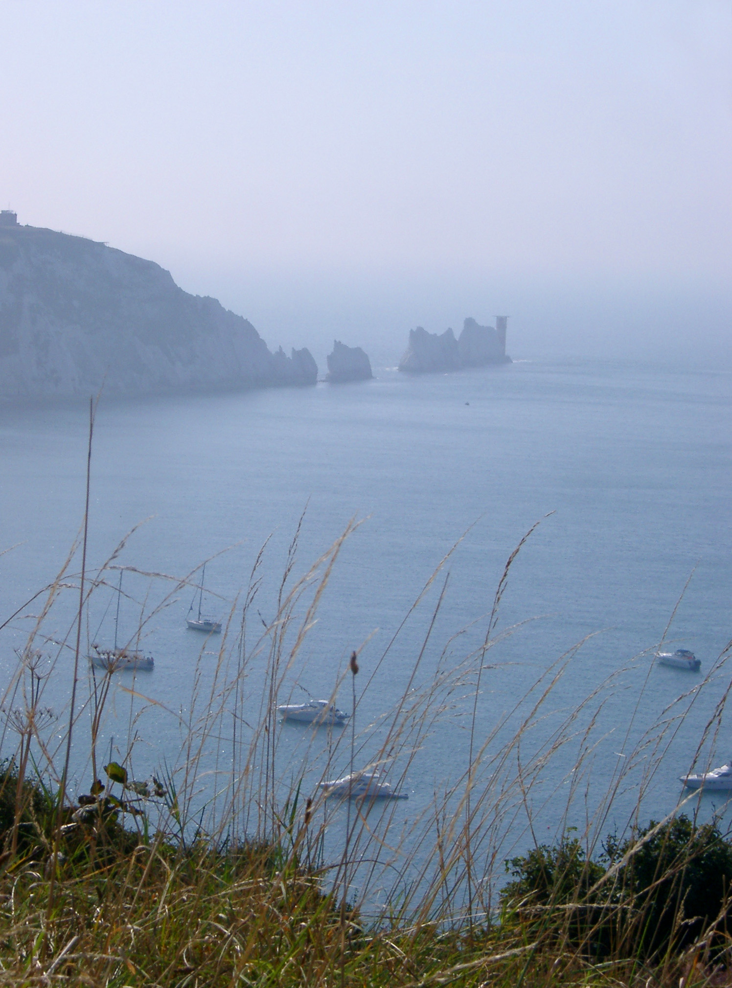 an image of View of the Needles, Isle of Wight, a row of eroded chalk stacks rising out of the ocean