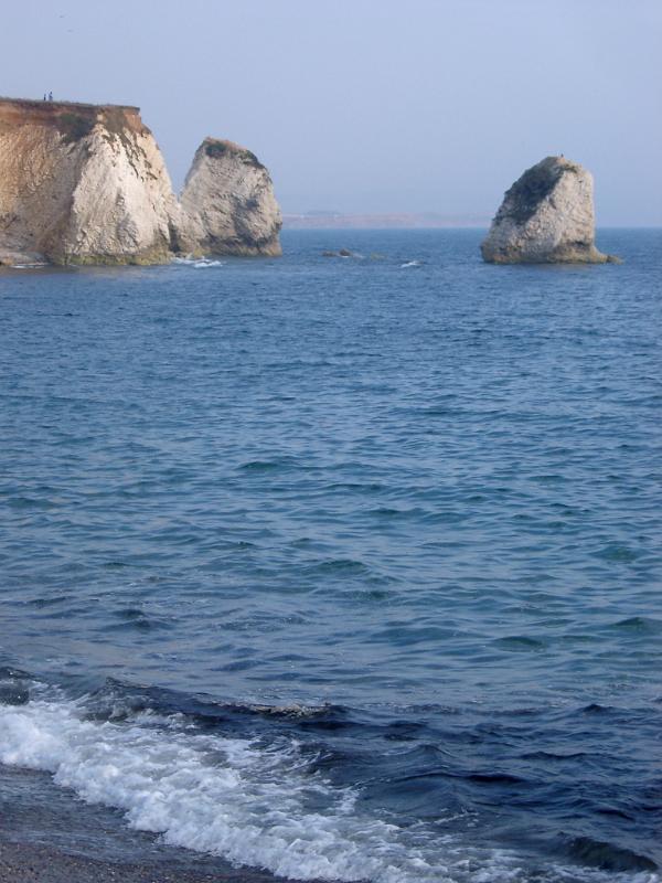 View of the line of chalk Needles, Isle of Wight, consisting of eroded chalk stacks rising directly from the ocean