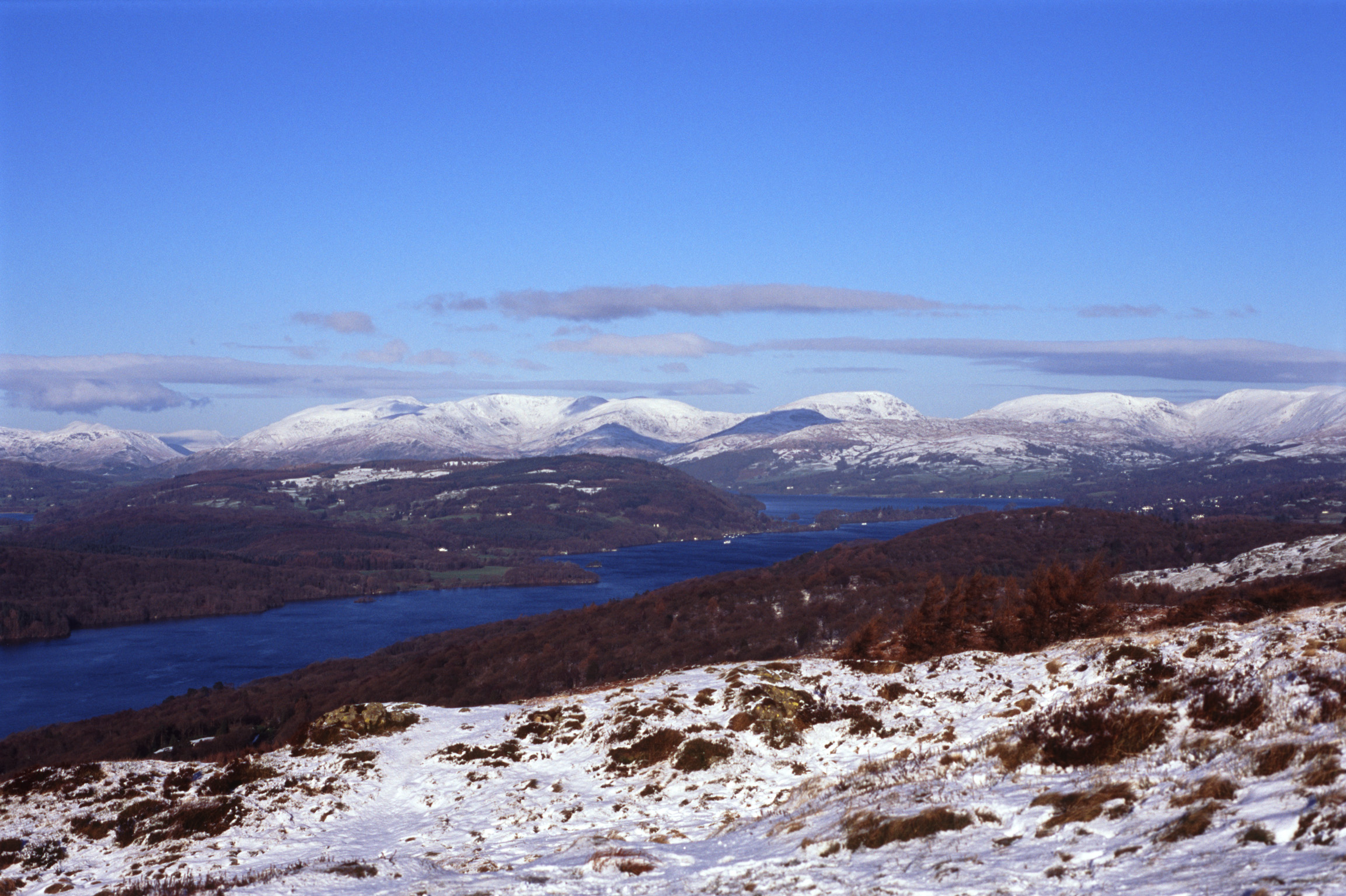 an image of a view up windermere towards the town of windermere in winter