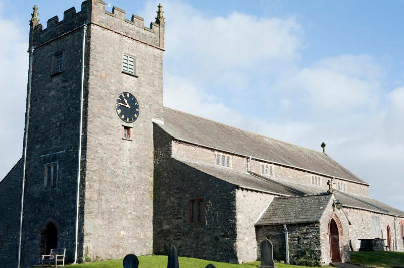 Close up of the old stone church at Hawkshead in Cumbria in the Lake District, a popular tourist destination