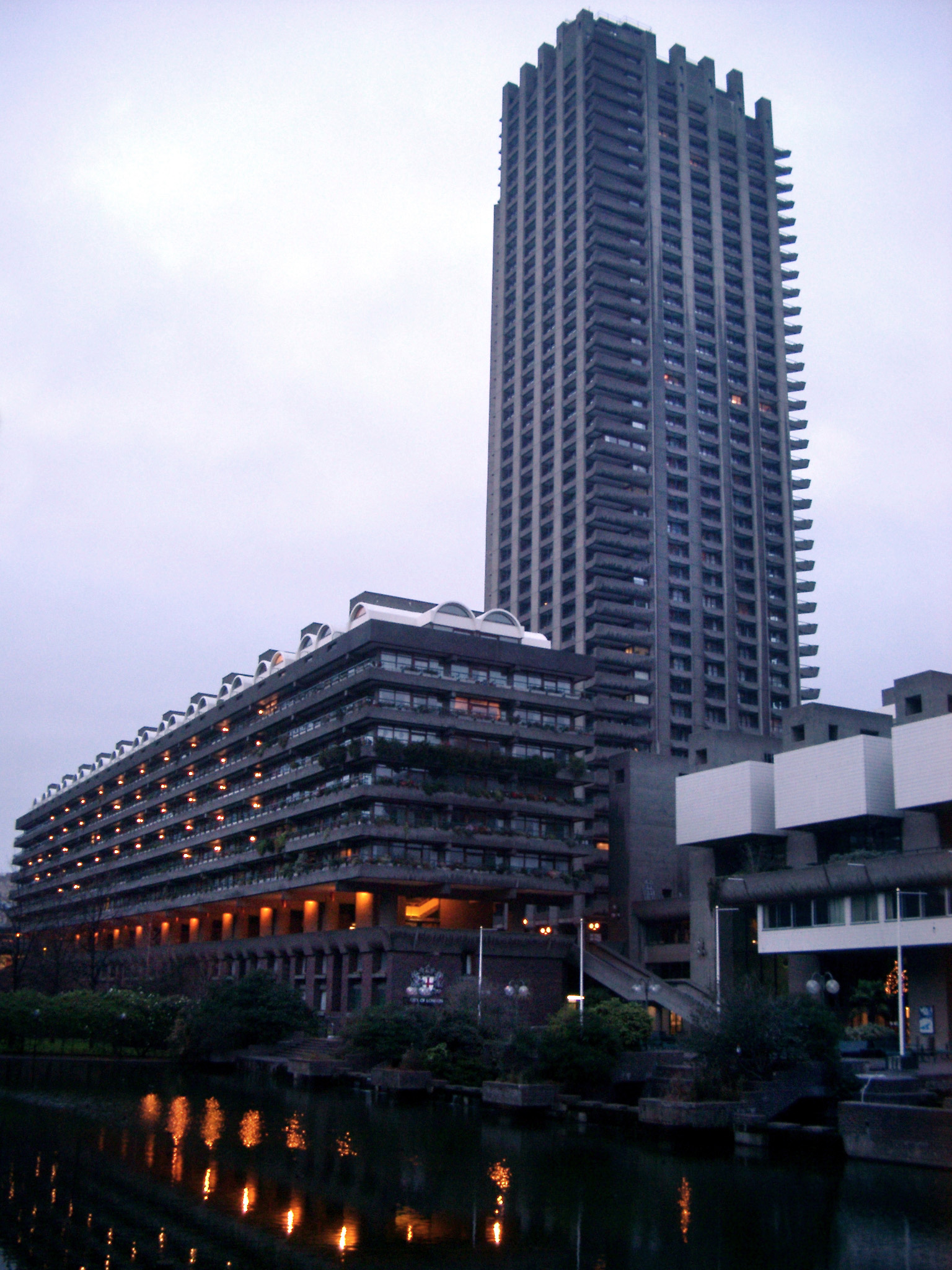 an image of Brutalist Architecture at the Barbican Arts Centre in London, England. Captured at Night Time.