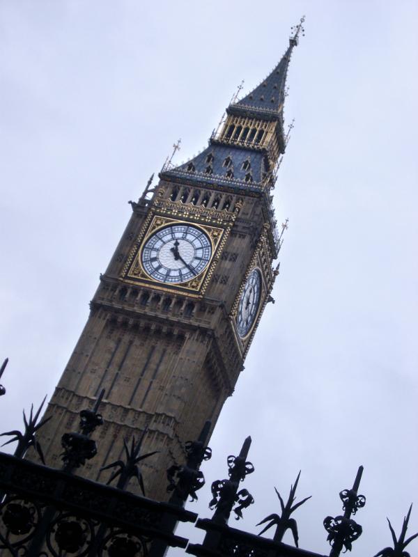 The Elizabeth Tower, or clocktower of the old Westminster Palace, London with its ornate Gothic facade and four clock faces or dials , also known as Big Ben and a popular tourist attraction