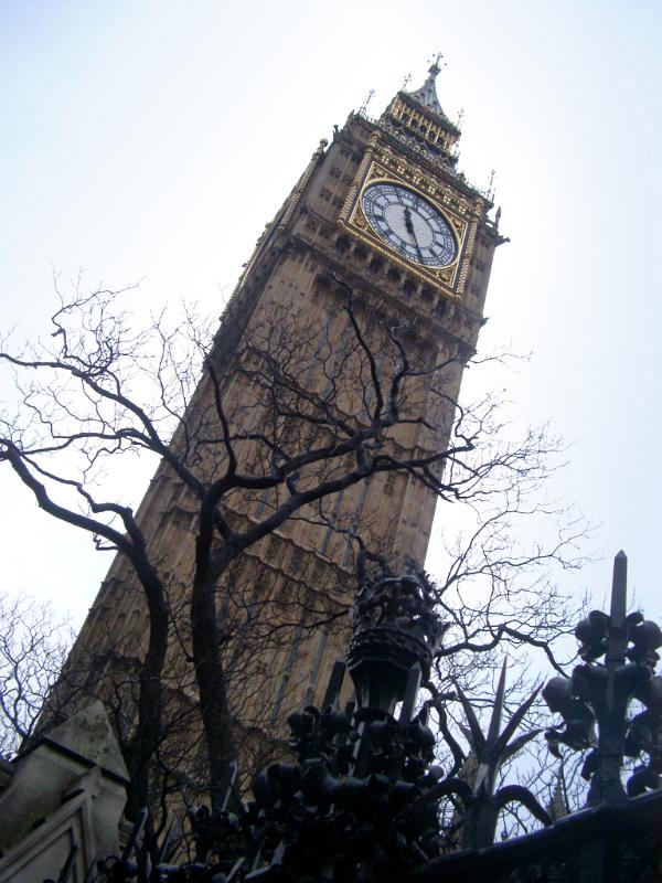 Low angle view looking up the classical Gothic style exterior of the Big Ben clock tower, Westminster, an iconic landmark for London and popular tourist attraction