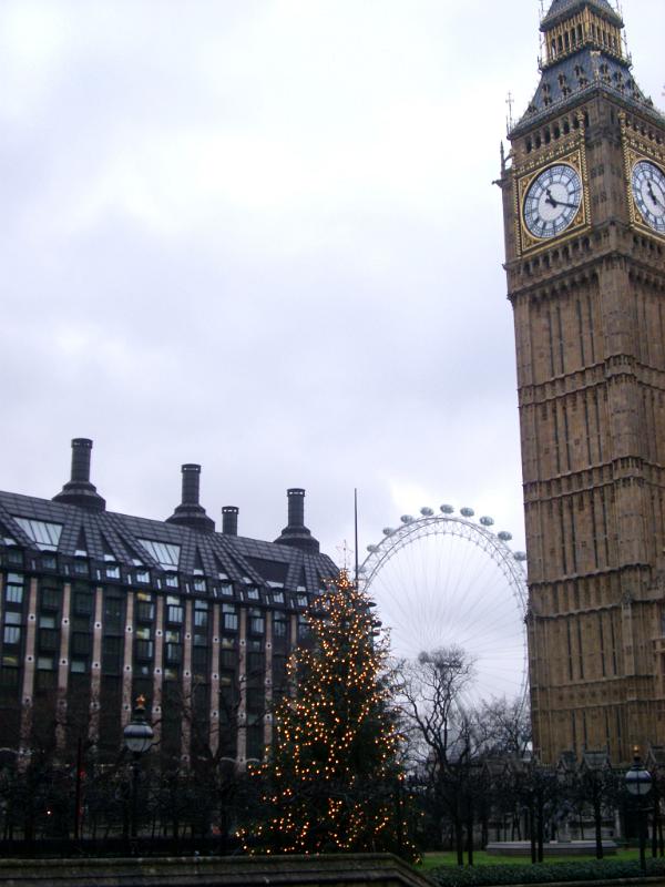 Big Ben or Elizabeth and London Eye on Very Light Blue Sky Background.