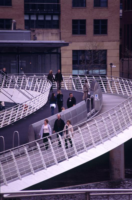 Winking Eye Bridge or The Gateshead Millennium Bridge, a pedestrian and cyclist tilt bridge spanning the River Tyne in England.