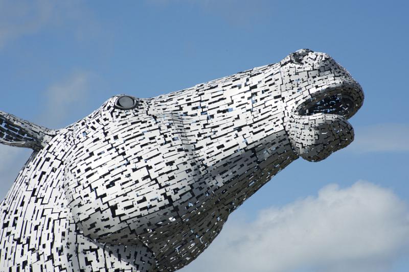 Close up of Kelpies statue in Scotland Close up of horse head on Kelpies statue which commemmorates horse powered industry in Scotland