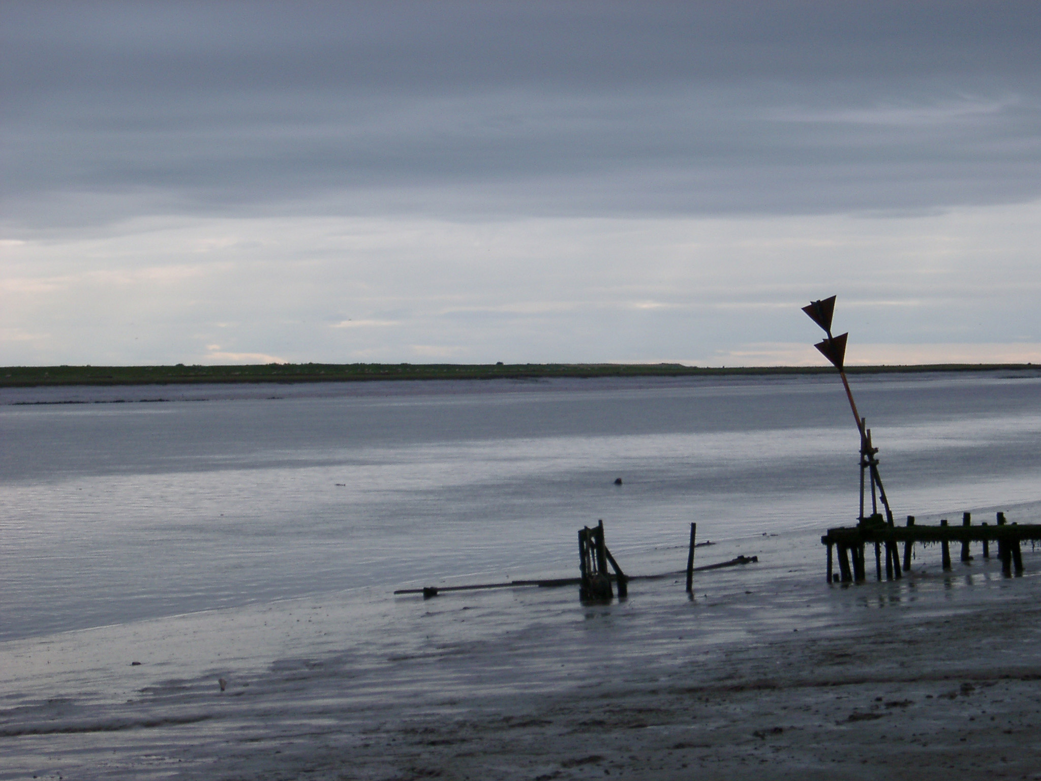 an image of stormy sky over a navigation channel