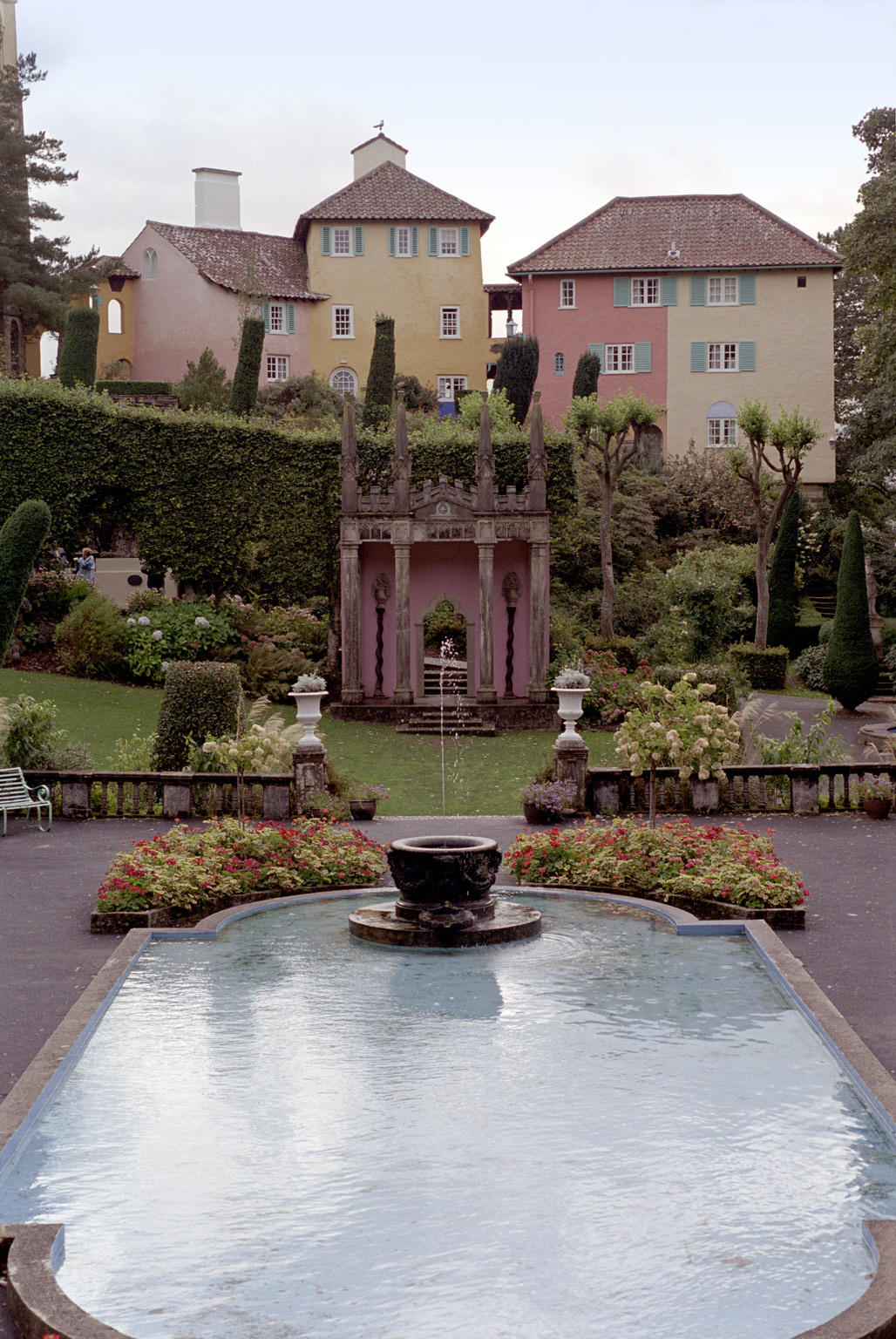 an image of Pond and buildings in Portmeirion, North wales, a quaint picturesque village modeled on Italian architecture and a popular tourist attraction