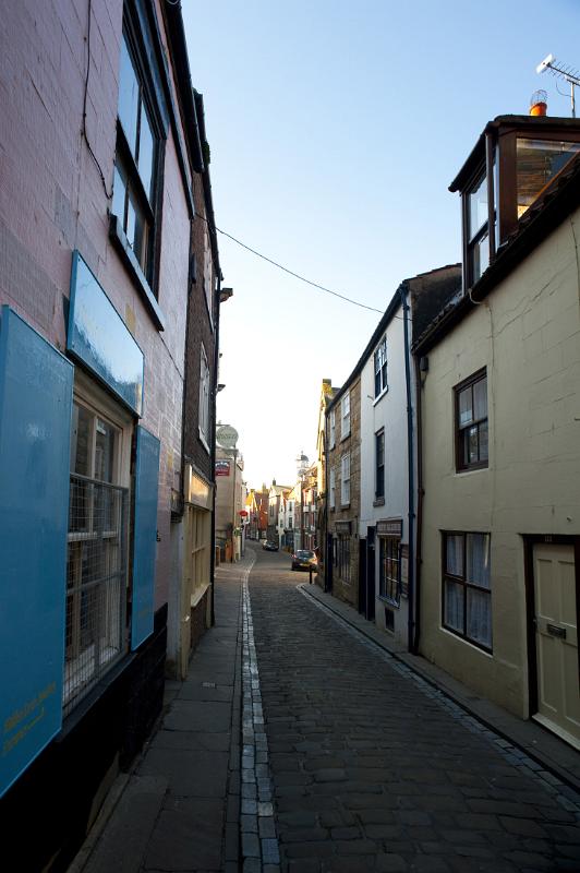 shops and houses along whitbys narrow church street