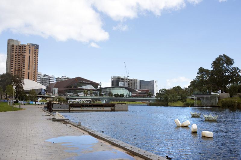 River in the city of Adelaide with high rise buildings in background, Australia.